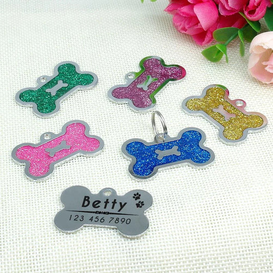 Glittering bone-shaped ID tag for dogs, made from durable stainless steel with customisable engraving