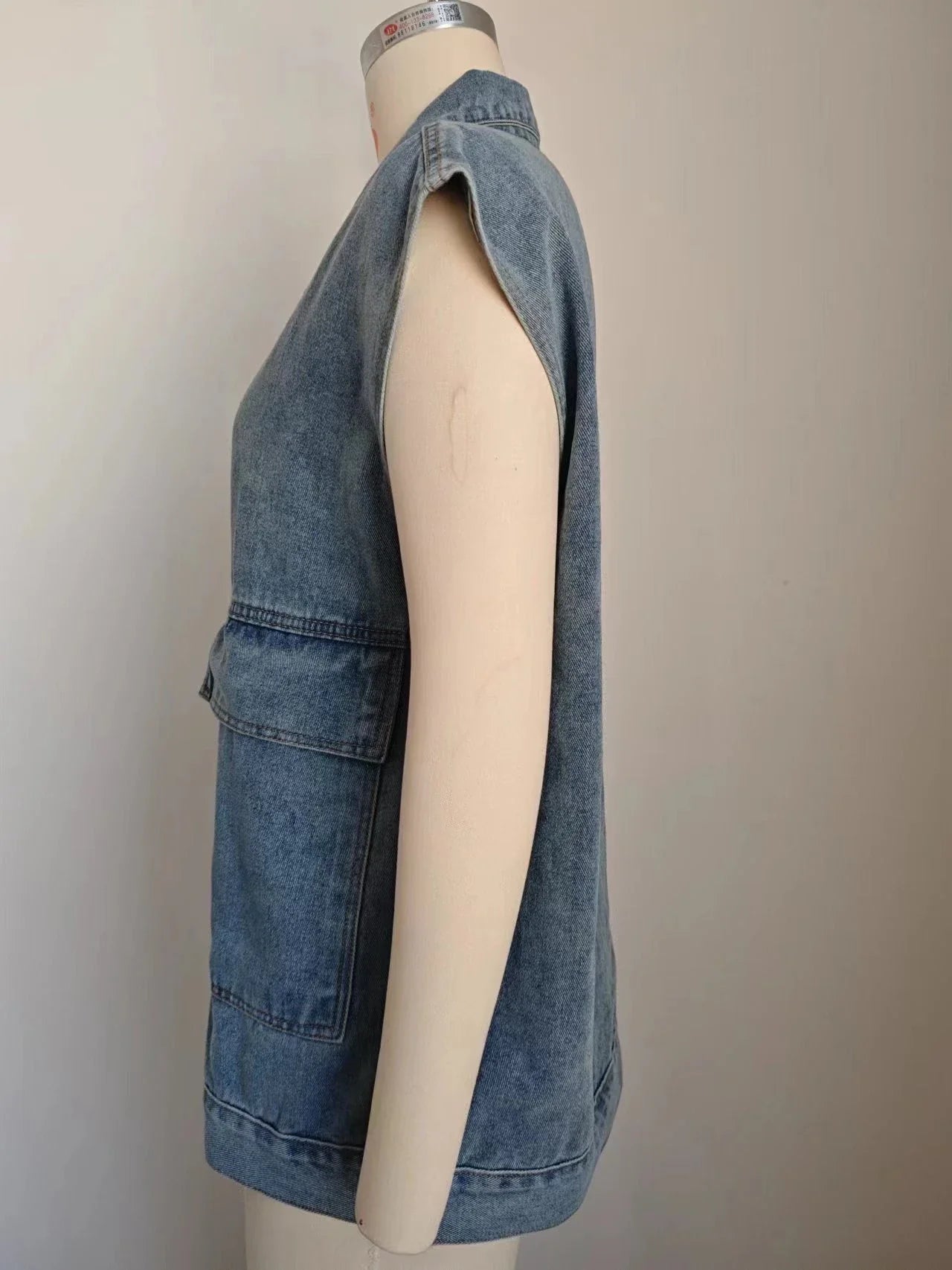 Denim vest with large pockets, sleeveless design for women's casual and formal wear