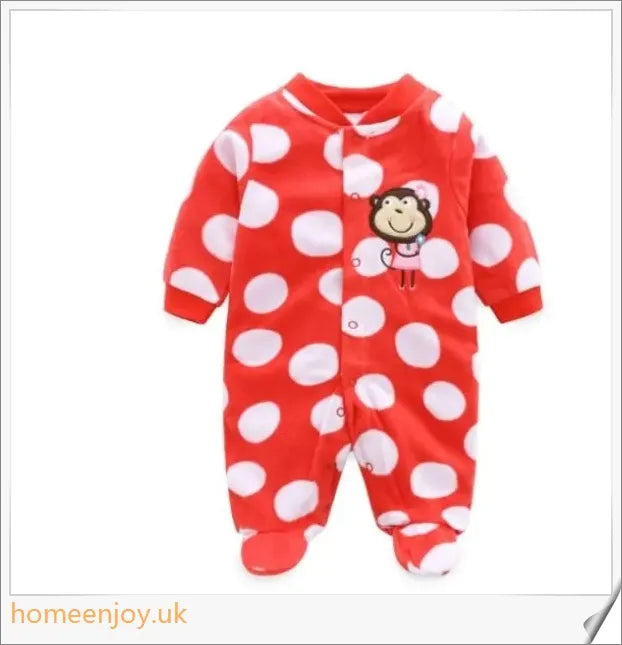 A cosy, printed one-piece baby romper with long sleeves and a foot wrap, made from premium polar fleece fabric.