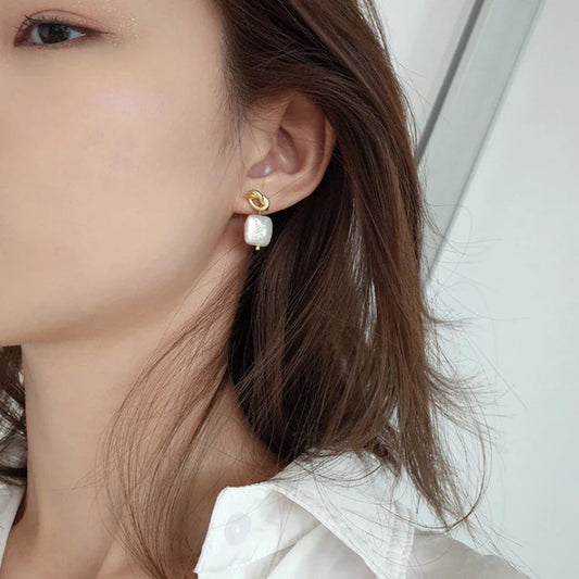 Stunning natural pearl earrings in a modern geometric design, crafted from premium 925 sterling silver