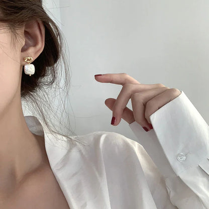Stunning natural pearl earrings in a modern geometric design, crafted from premium 925 sterling silver