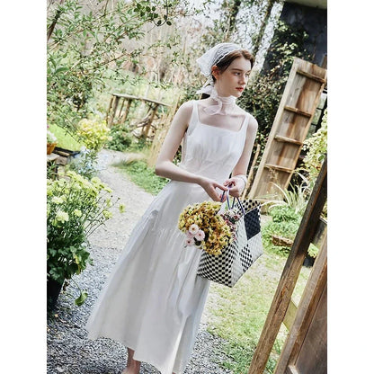 Elegant French white suspender long dress made from premium 100% cotton for effortless style