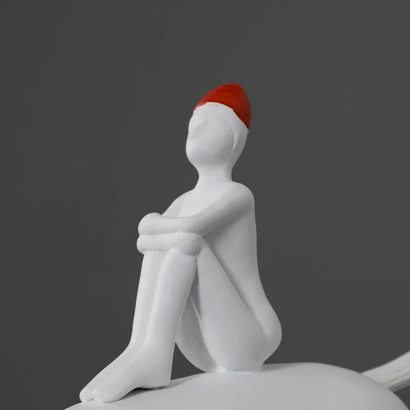 A charming white resin animal-inspired ornament for children's room decor