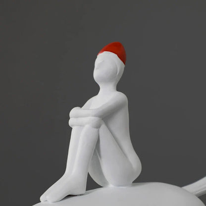 A charming white resin animal-inspired ornament for children's room decor