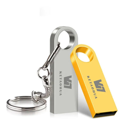 Custom silver metal car-shaped USB flash drive on a white background