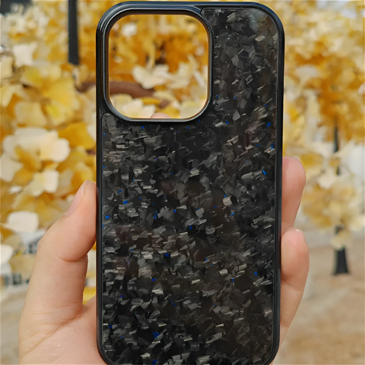 Magnetic plastic phone case for iPhone 12-15 in seven colours including Classic Carbon and Forged Blue.