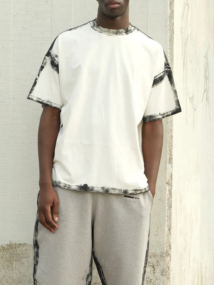 White casual short sleeve top with draped design and printing detail on regular fit polyester construction