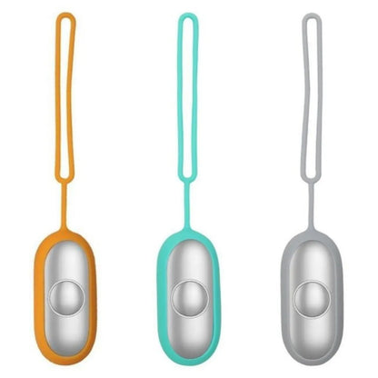 Hand-held micro-current sleep aid device in grey, green, or orange with round button and USB charging port