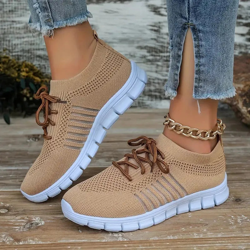 Women's flying knit casual flats with mesh upper, round toe, and front-tie design in multiple colour options