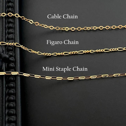 Ghost pendant necklace with titanium steel construction and electroplated finish on twisted chain