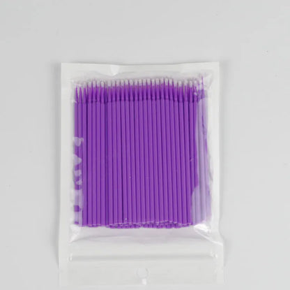 Disposable micro applicator brushes with coloured plastic handles and bendable cotton swab tips