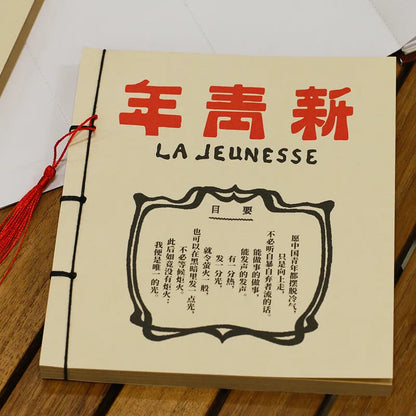 A5 antique wire-bound notebook with classical artwork cover, black oil wax rope binding, and decorative tassels