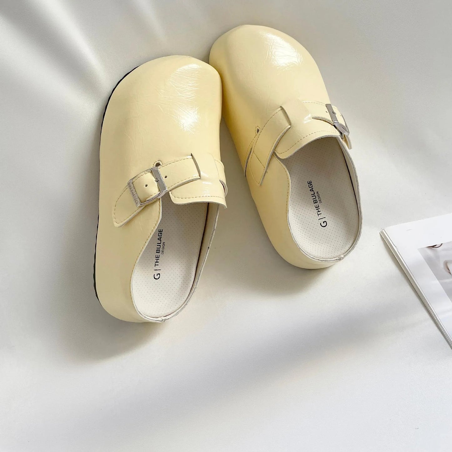 Flat buckle casual sneakers in yellow with round toe and PU upper