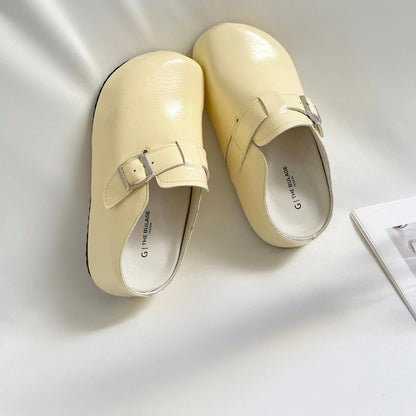 Flat buckle casual sneakers in yellow with round toe and PU upper