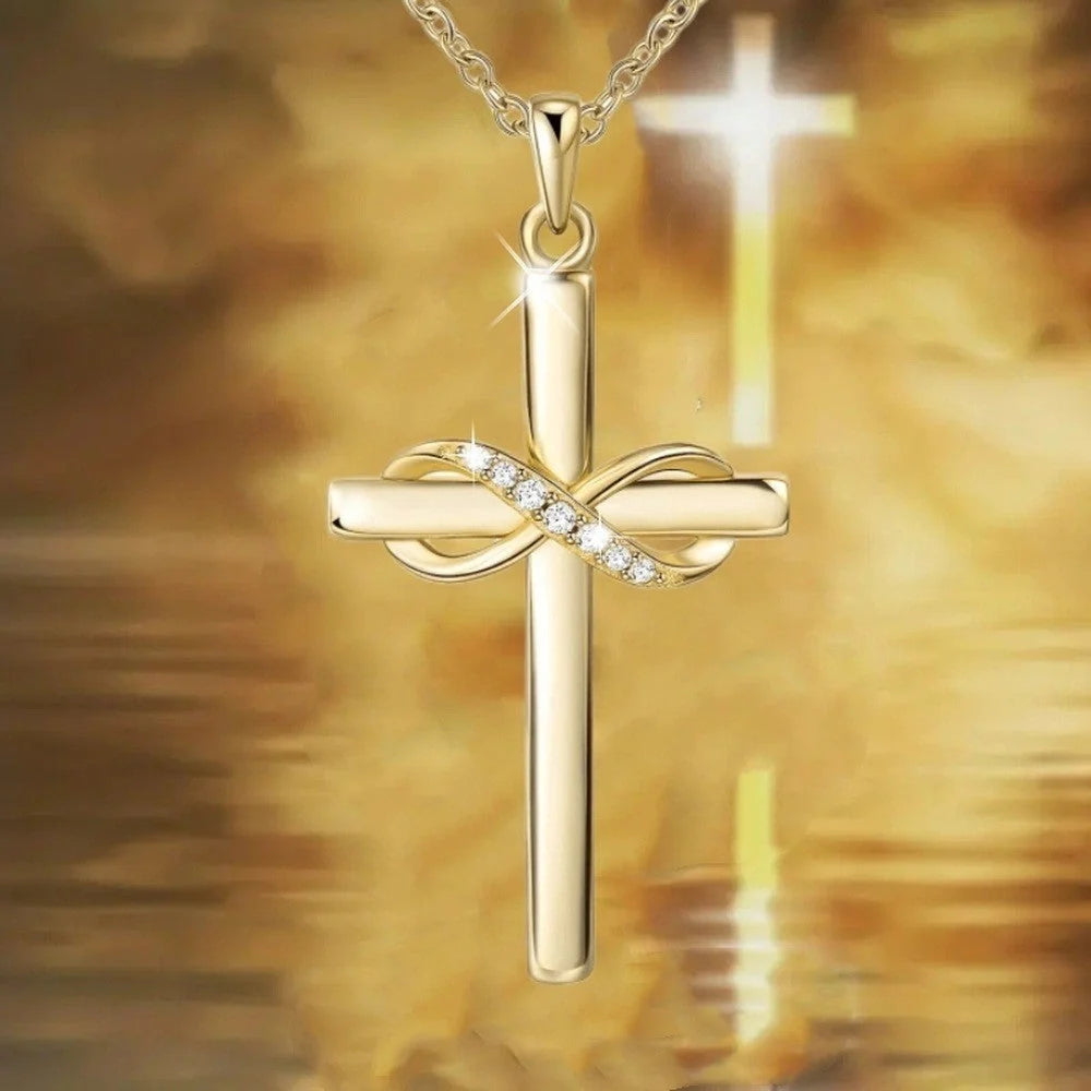 Elegant gold cross and infinity pendant necklace for women, showcasing timeless beauty and spiritual meaning.
