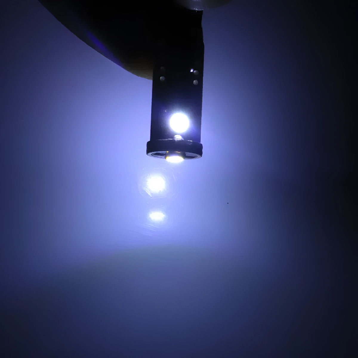 T10 W5W LED car light in blackboard white colour with 23mm by 9mm dimensions
