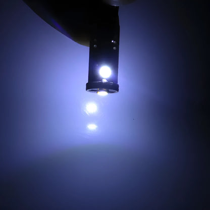 T10 W5W LED car light in blackboard white colour with 23mm by 9mm dimensions