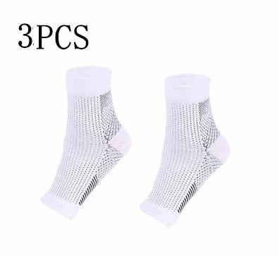 Anti-fatigue compression foot sleeve in black, red, or white, featuring moisture-wicking fabric and a heel hole for breathability.