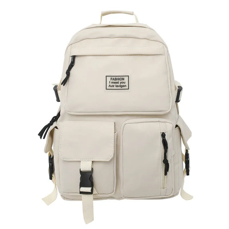 Black and white nylon student backpack with laptop compartment and three-dimensional pocket.
