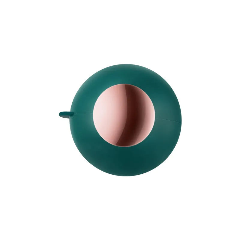 Reusable gel lint roller ball in green gold colour for removing pet hair and lint from fabrics.