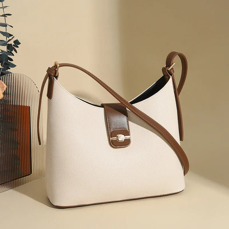 Large-capacity PU leather bucket bag with internal organisation compartments in urban simplicity style