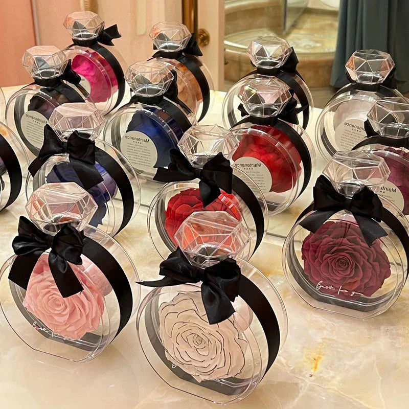Preserved dried rose floral ornaments in a transparent display, available in various colors for home decor and special occasions