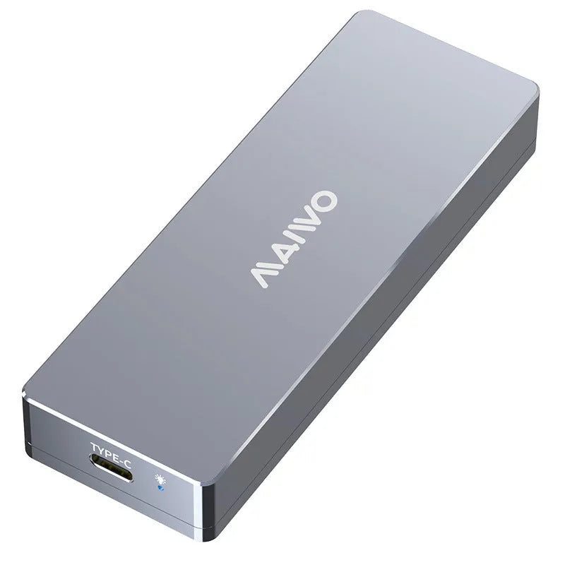 Silver Type-C M.2 SSD hard drive enclosure with screwdriver and accessories on a table