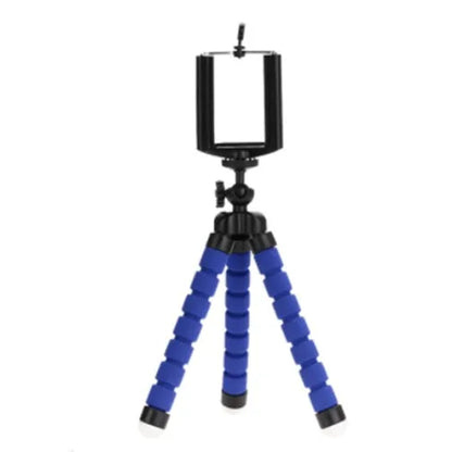 Black flexible octopus tripod with legs wrapped around a pole, holding a smartphone with a clip mount.