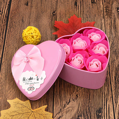 Handmade soap flowers in red heart-shaped tin box measuring 12x12x5cm