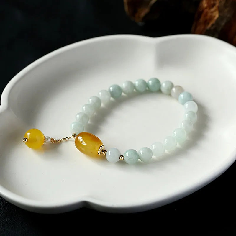 Geometric women's bracelet with hanging agate tassel and 14K gilded elements