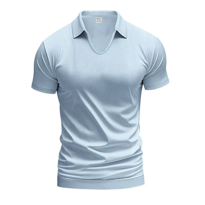 Man modelling a loose-fit apricot coloured V-neck short-sleeve T-shirt for casual summer wear.