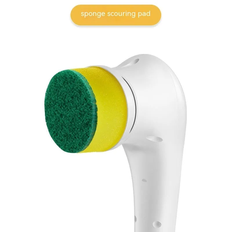 White cordless electric handheld scrubber with five attached brush heads on a kitchen counter