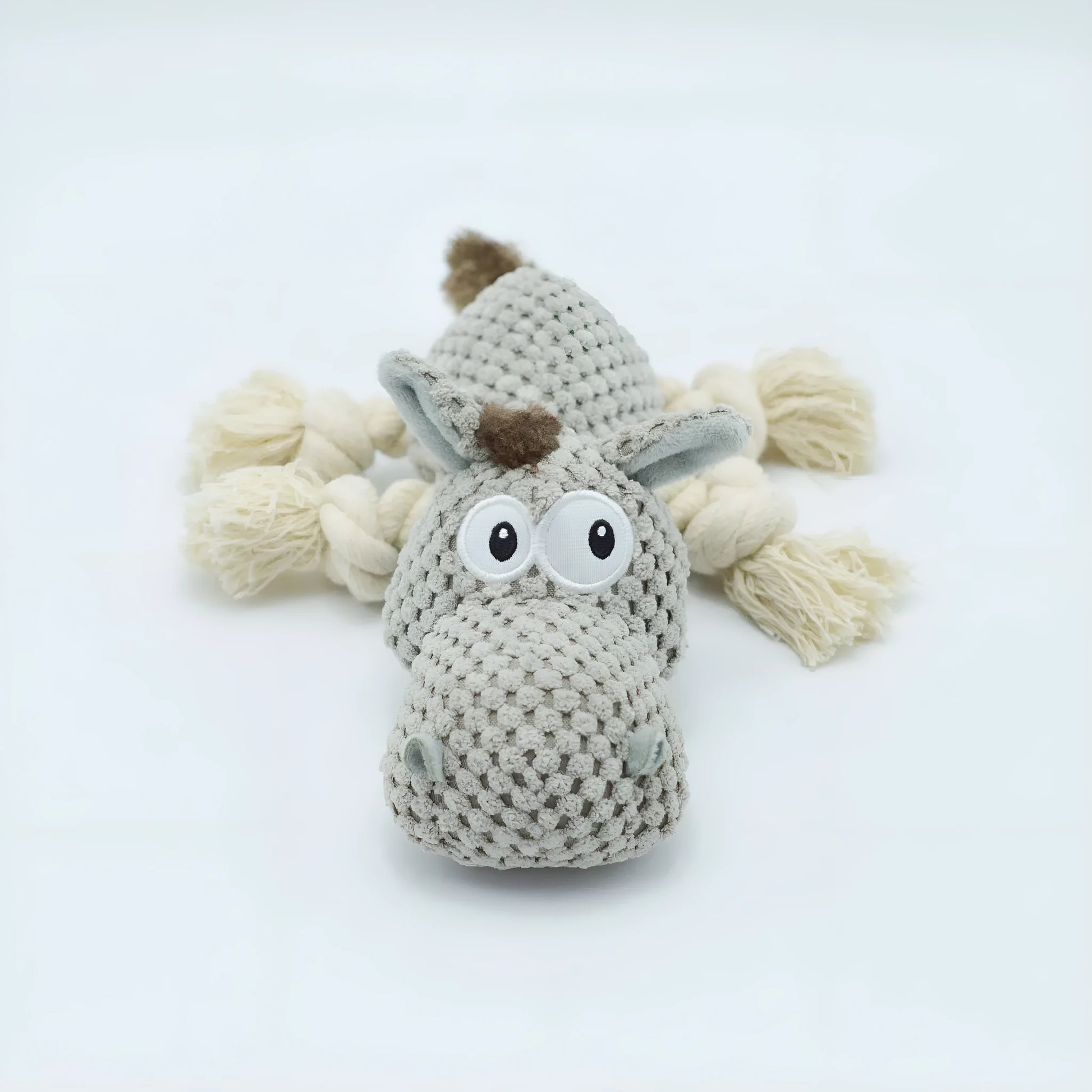 Grey donkey-shaped plush dog toy with cloth velvet material showing creaking sound feature