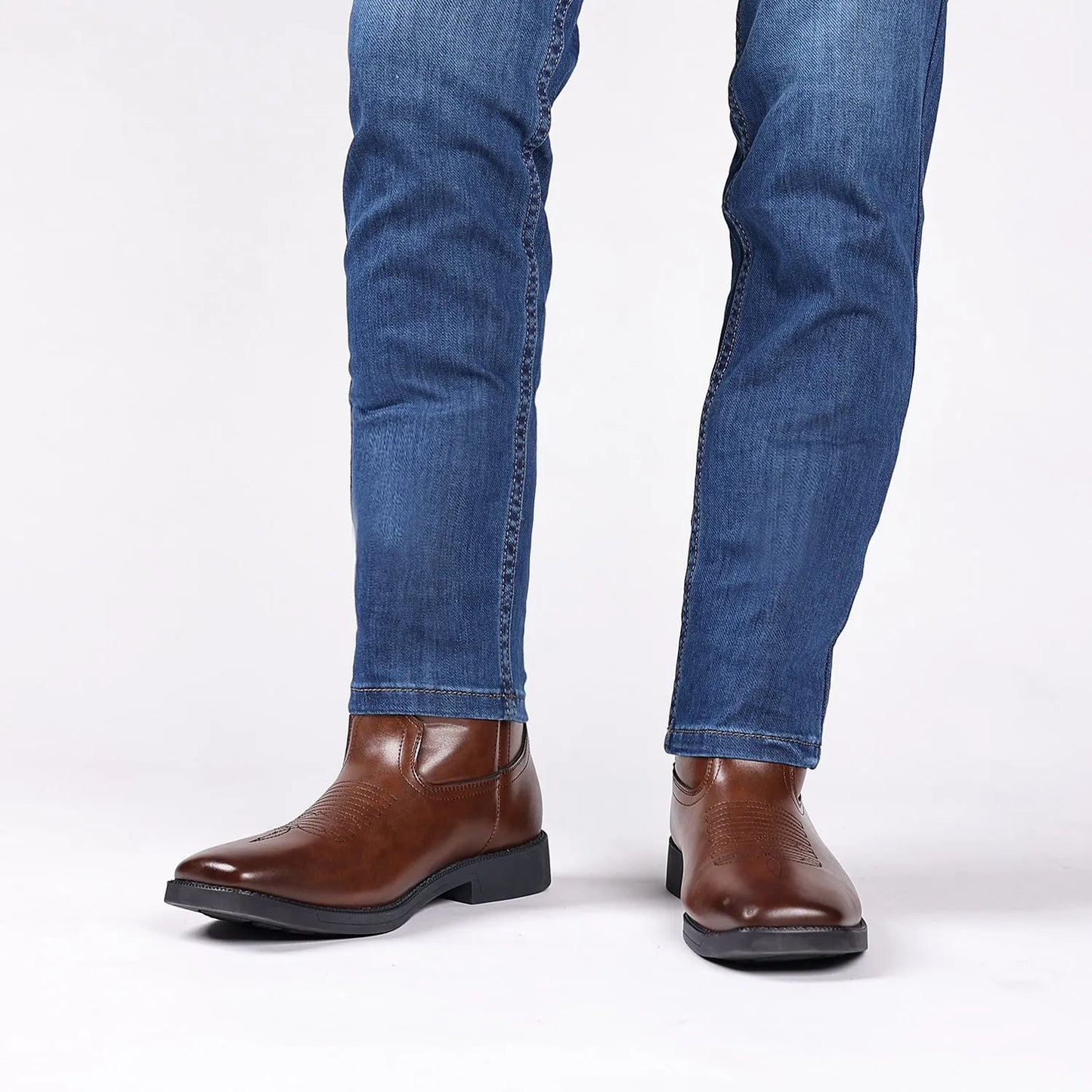Men's brown retro wide square-toe cowboy boots with high shaft and horseshoe low heel on a white background.