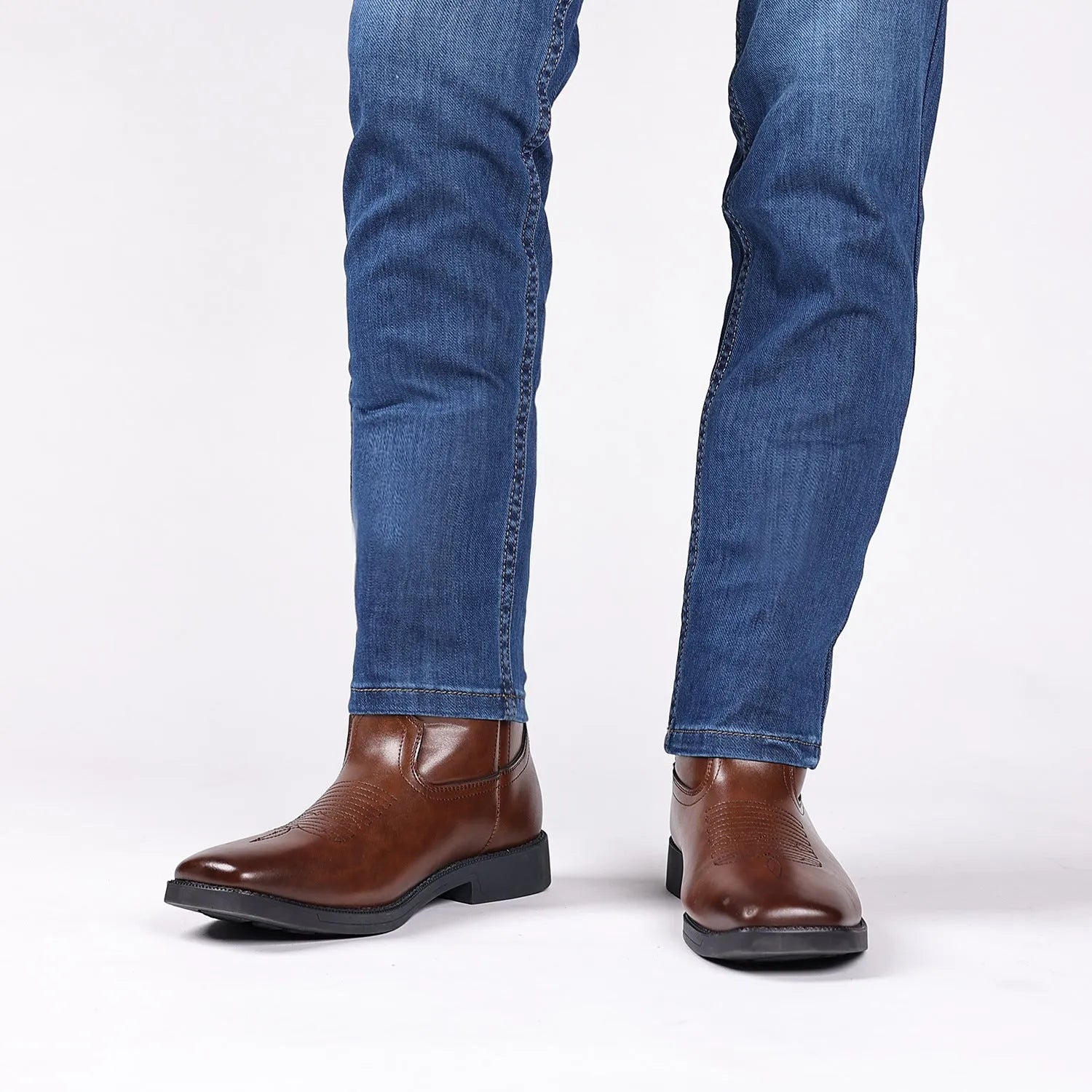 Men's brown retro wide square-toe cowboy boots with high shaft and horseshoe low heel on a white background.