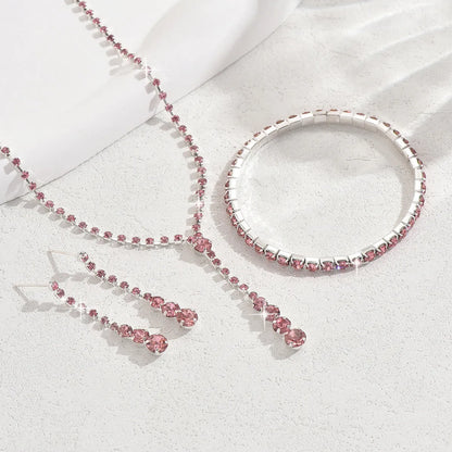 Rhinestone heart pendant jewellery set with necklace, bracelet and earrings in silver pink colour