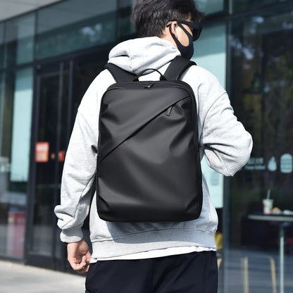 Large black waterproof PU leather laptop backpack with sewing thread details on a simple design.