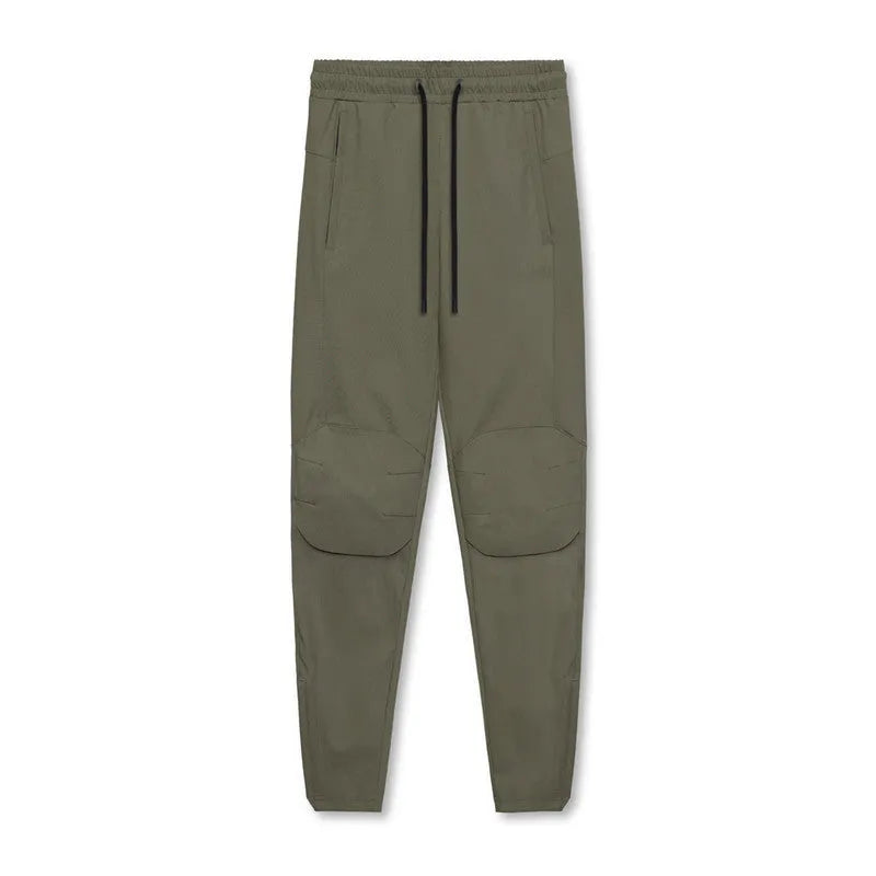 Men's grey fitness trousers with ankle ties, made from 100% polyester for quick-drying during exercise