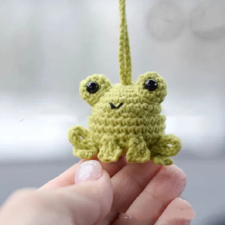 Handmade woven plush frog car pendant in green, 5cm wide by 15cm long