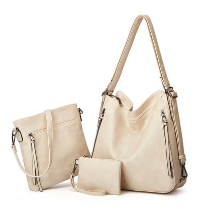 Women's three piece bag set in PU with tote, crossbody and back bag, 34 x 12 x 34 cm, zip closure