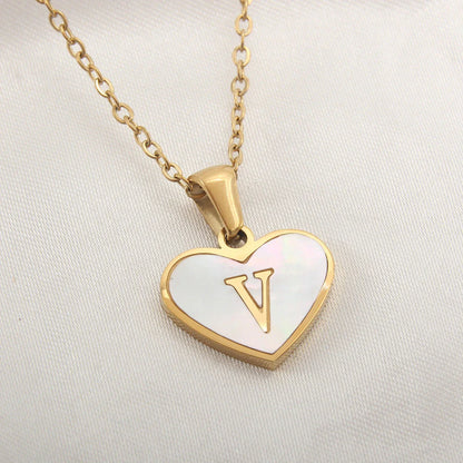 Personalized heart-shaped white shell necklace with adjustable clavicle chain, a stylish and versatile jewelry piece for women
