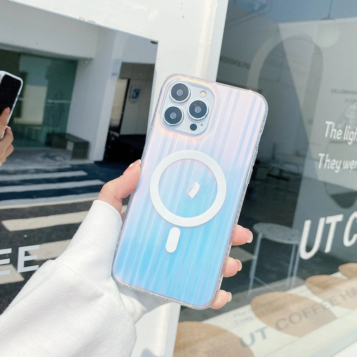 Transparent frosted magnetic iPhone case for iPhone 14 Pro Max, 13 Pro Max, 12 Pro Max, made from TPU and PC with wavy pattern.