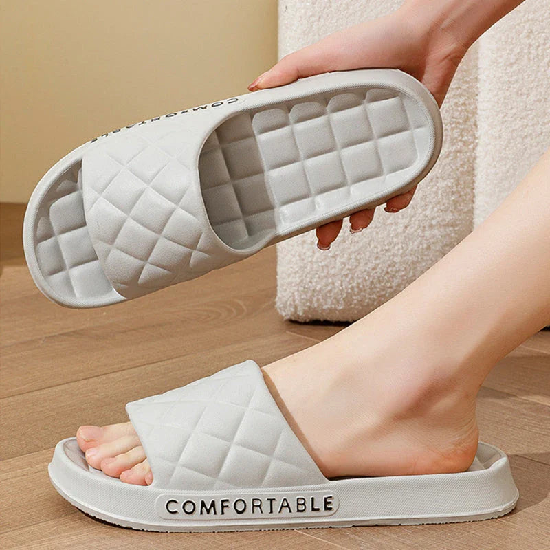 Stylish plaid slippers with soft, cushioned soles for comfortable indoor wear
