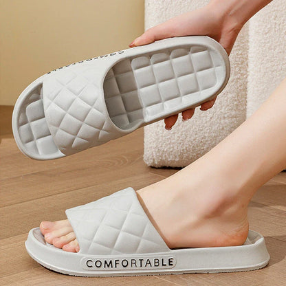Stylish plaid slippers with soft, cushioned soles for comfortable indoor wear