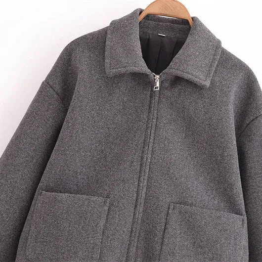 Grey PU women's short jacket with shirt collar, zip front and patchwork splicing, 50cm length