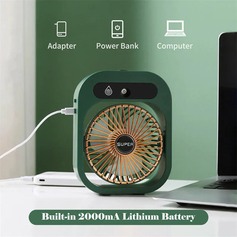 Green and white USB rechargeable misting fan humidifier with adjustable head on a desk