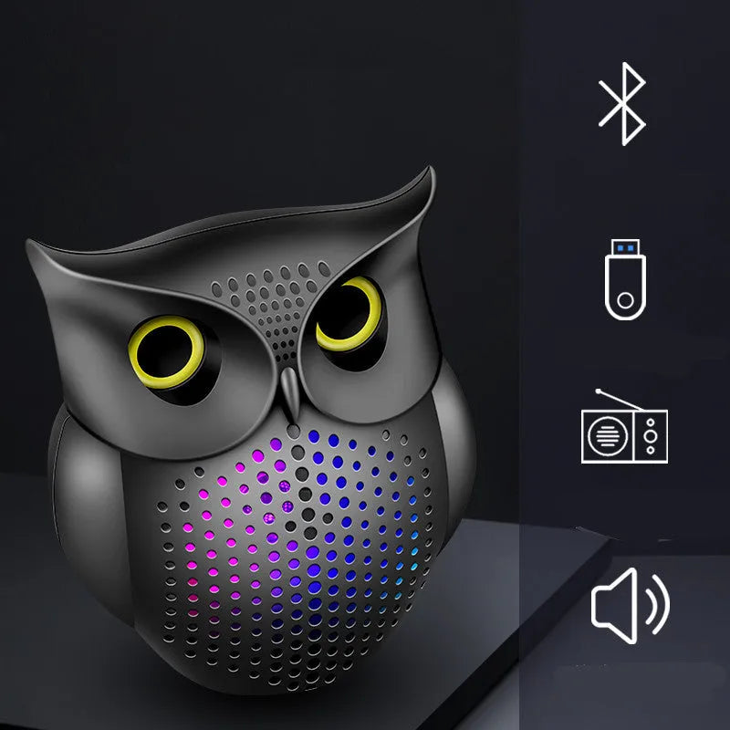 Black cartoon owl design wireless Bluetooth speaker measuring 4 inches tall with USB charging port