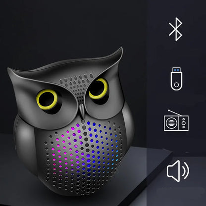 Black cartoon owl design wireless Bluetooth speaker measuring 4 inches tall with USB charging port