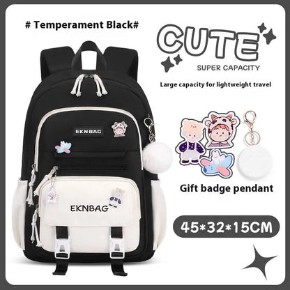 Pink girls school backpack with curved shoulder straps on a wooden floor