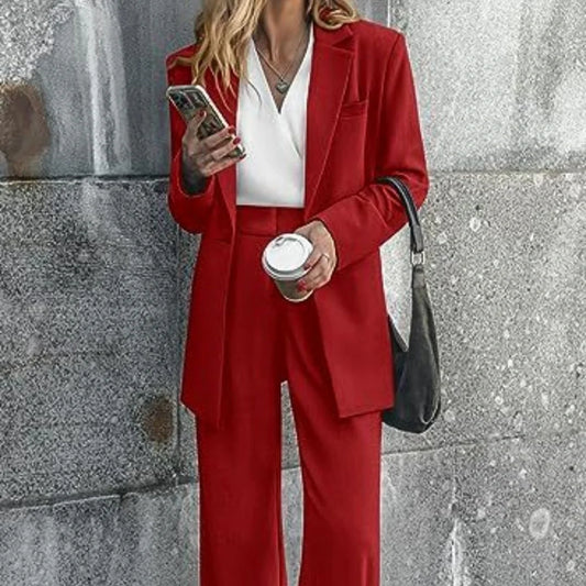 Tailored ladies' suit in various colours, featuring a jacket and trousers made of premium polyester fabric.